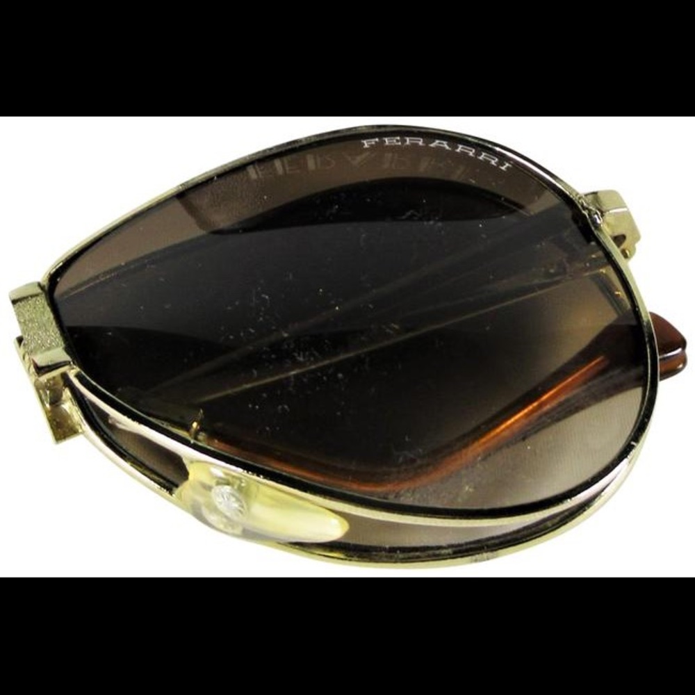 Ferrari folding sunglasses with case. Unisex